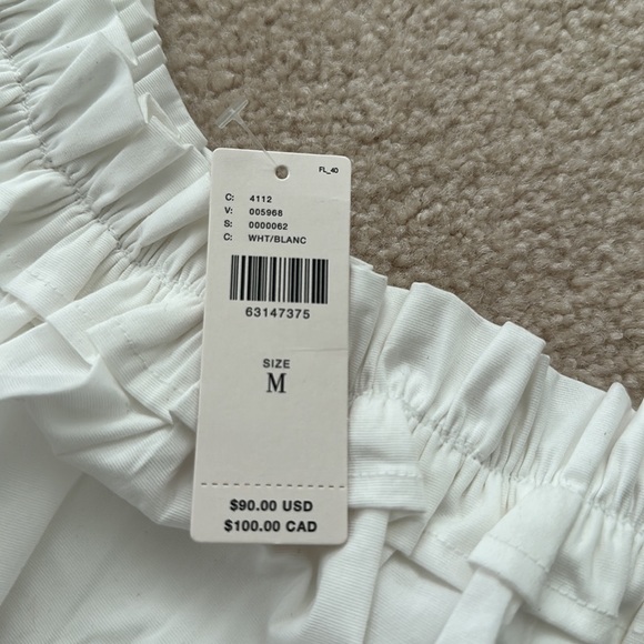 1 shoulder white ruffle shirt. By porridge. New with tags. Ribbed texture body. - Picture 2 of 6